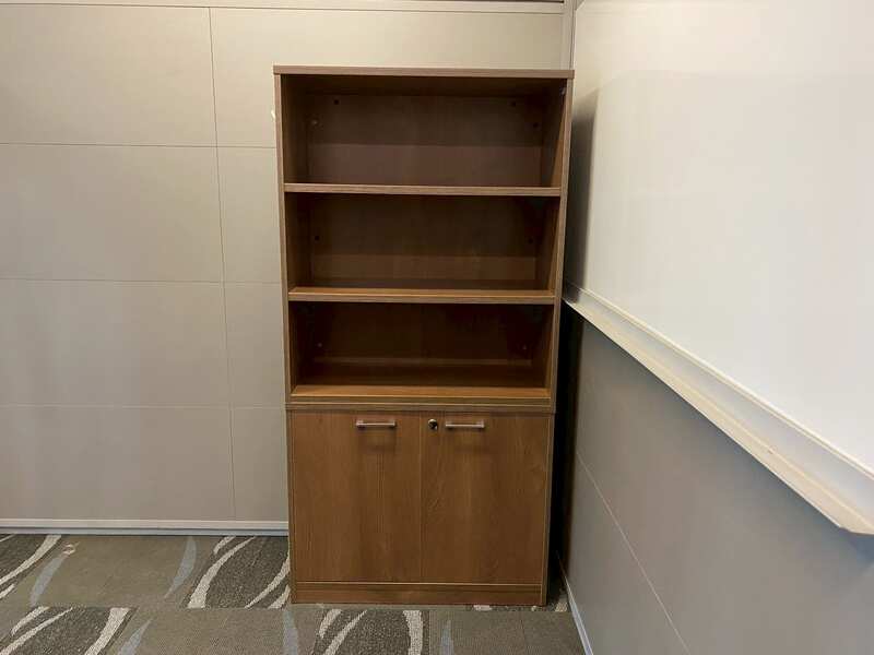 Tall filing cabinet with 2 doors and 3 shelves, brown wooden frame