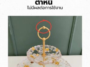 Two-tiered glass dessert and fruit stand with floral design and gold rim, European style.