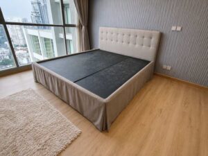 6-foot bed with button tufting, grey fabric mattress, and a 6-foot white topper.