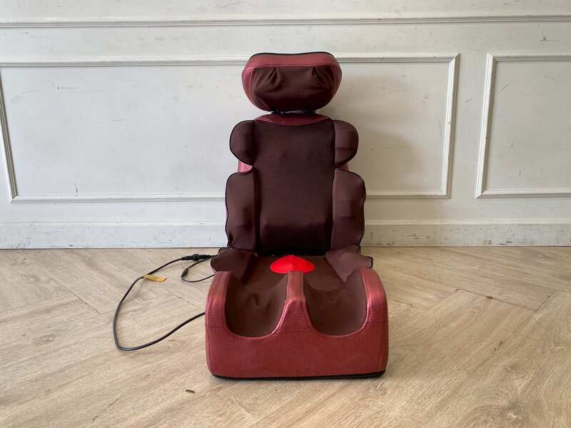 Portable electric massage cushion with remote control, red fabric cushion.