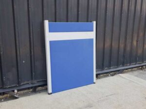 Solid blue partition with white stripes