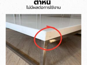 Coffee table with white synthetic stone top and stainless steel legs. (1)