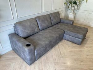 L-shaped corner sofa, 3-seater, grey leather upholstery, with cup holders.