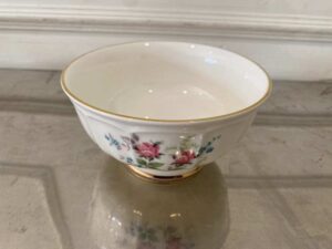 Ceramic mug with pink rose pattern and gold rim, Quality Ceramic brand.