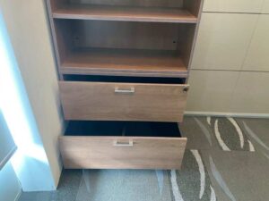 Tall filing cabinet with 2 drawers and 3 shelves, wooden frame, brown.