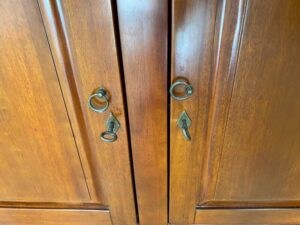 Teak wood display cabinet with 3 glass doors, 3 wooden doors, and 3 drawers.