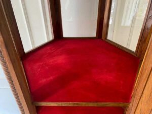Vintage style brown glass display case with 4 shelves.