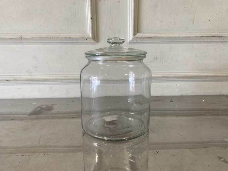 Multipurpose glass jar with lid for food preservation, IKEA brand.