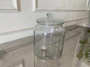 Multipurpose glass jar with lid for food preservation, IKEA brand.