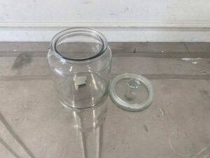Multipurpose glass jar with lid for food preservation, IKEA brand.