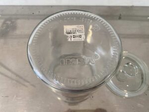 Multipurpose glass jar with lid for food preservation, IKEA brand.