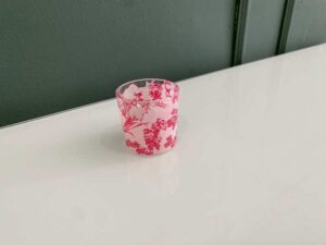 Japanese-style tea cup with cherry blossom pattern that changes color according to temperature.