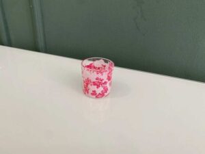 Japanese-style tea cup with cherry blossom pattern that changes color according to temperature.