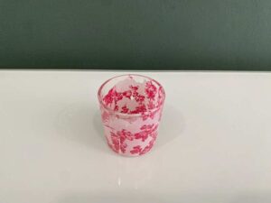 Japanese-style tea cup with cherry blossom pattern that changes color according to temperature.