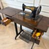 Vintage SINGER Sewing Machine with Solid Wood Cabinet