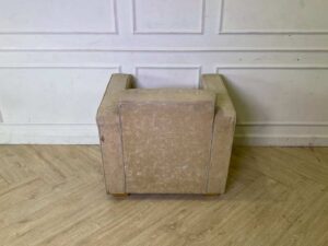 Cream-colored fabric armchair._RWY1JBR5BL