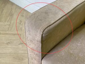 Cream-colored fabric armchair._RWY1JBR5BL