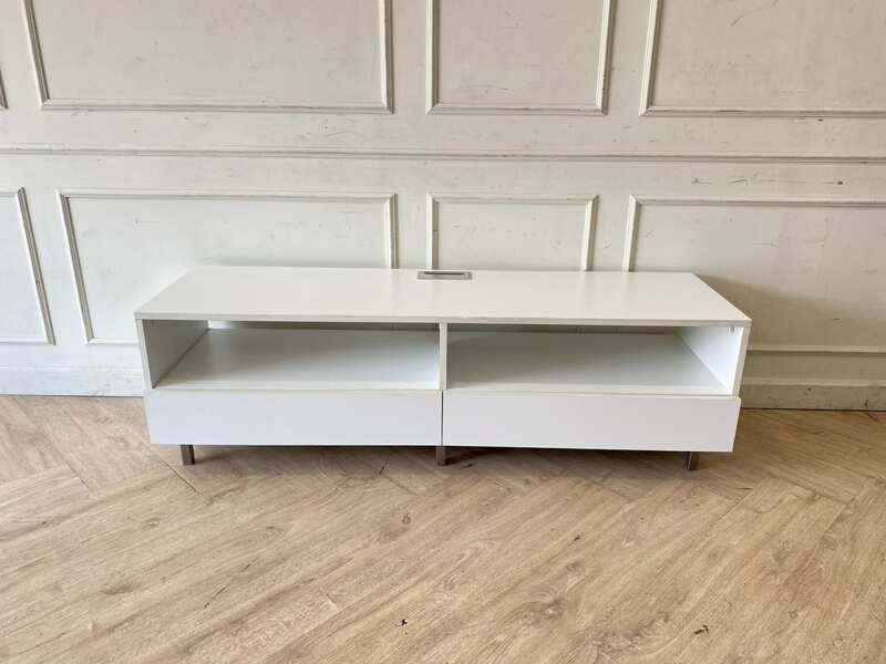 Wooden TV stand with 2 drawers and 2 storage compartments, includes power strip, white color.