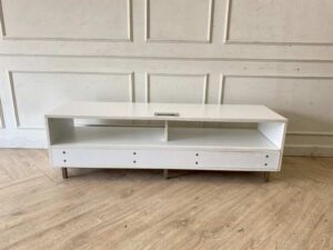 Wooden TV stand with 2 drawers and 2 storage compartments, includes power strip, white color.