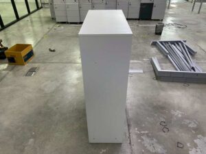 Tall shoe cabinet with two doors.