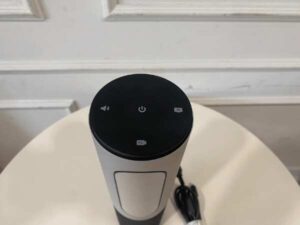 Black Logitech conference webcam with microphone and speaker