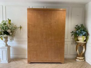 Teak wood cabinet with 5 doors, 9 drawers, and 2 shelves.