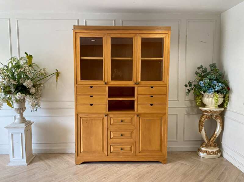 Teak wood cabinet with 5 doors, 9 drawers, and 2 shelves.