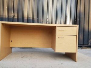 Two-drawer desk, brown wooden frame, 150 cm wide.