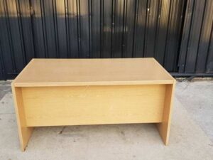 Two-drawer desk, brown wooden frame, 150 cm wide.