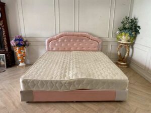6-foot bed with leather cushions and button-tufted pink mattress. 6-foot mattress, 9-inch thick.