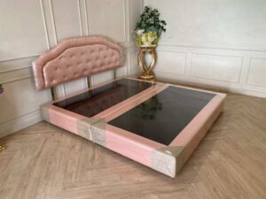 6-foot bed with leather cushions and button-tufted pink mattress. 6-foot mattress, 9-inch thick.
