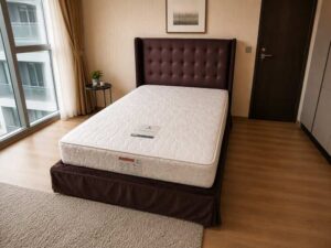 5-foot bed with button-tufted velvet upholstery in cocoa brown color. 5-foot mattress with gold vine pattern, Springmate brand, Pocket Coil Contract model.