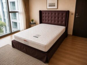 5-foot bed with button-tufted velvet upholstery in cocoa brown color. 5-foot mattress with gold vine pattern, Springmate brand, Pocket Coil Contract model.