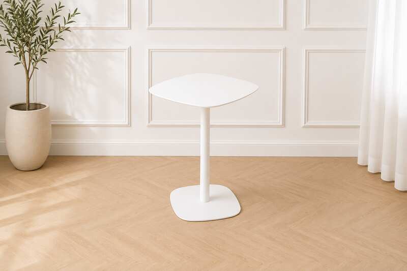 Round table with white steel legs, modern style._V8JVXVFEXB