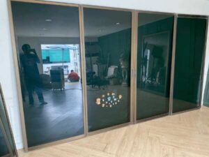 Sliding glass door with fixed panel