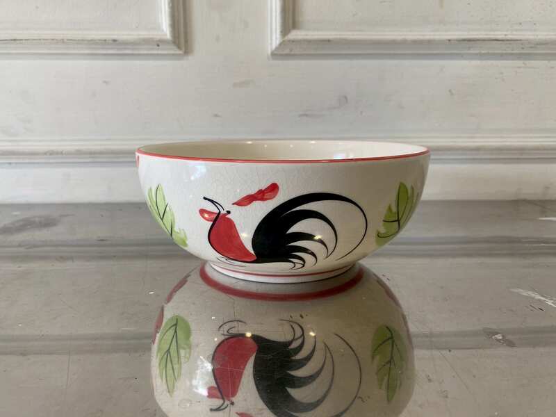 8-inch ceramic bowl with rooster logo, red rim.