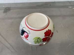 8-inch ceramic bowl with rooster logo, red rim.