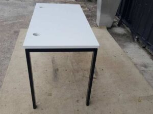 Work desk with white MDF top and black steel legs.