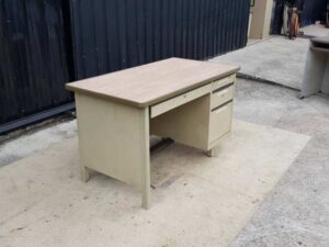 TAIYO brand cream-colored steel desk with 3 drawers and a wood top.