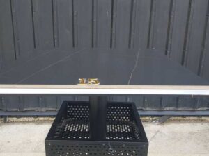 Bar table, wooden top, black steel legs, width 60 cm.