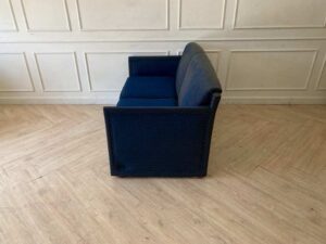 Two-seater sofa, fabric upholstery, blue color.