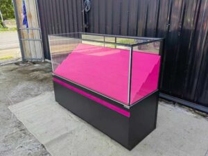 Retail Glass Display Showcase with Tiered Shelves and Pink–Black LED Lighting