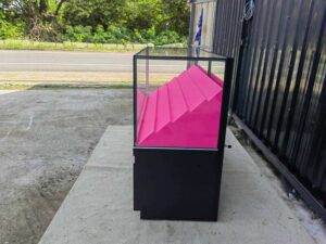 Retail Glass Display Showcase with Tiered Shelves and Pink–Black LED Lighting