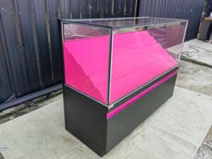 Retail Glass Display Showcase with Tiered Shelves and Pink–Black LED Lighting