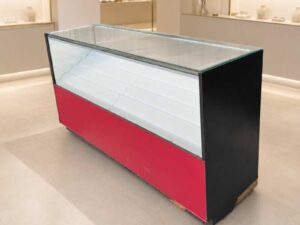 210 cm Red–Black LED Glass Display Counter with White Tiered Shelves and Rear Storage Compartments