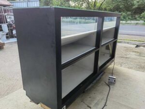 210 cm Red–Black LED Glass Display Counter with White Tiered Shelves and Rear Storage Compartments