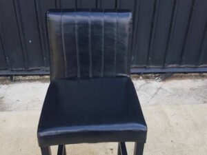 Bar stool with leather cushion and metal legs, black