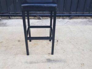 Bar stool with leather cushion and metal legs, black
