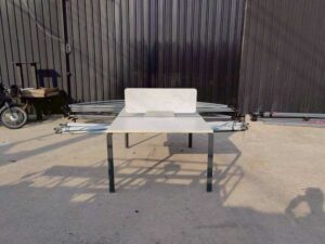 White, steel-legged, two-seater group workstation with partitions, Rockworth brand. (1)