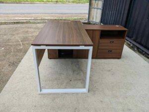 Brown L-shaped desk with attached cabinet